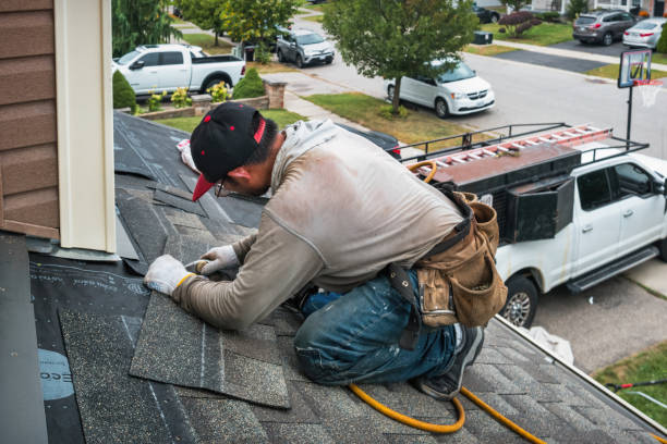 Professional Roofing technician working in Topping, VA